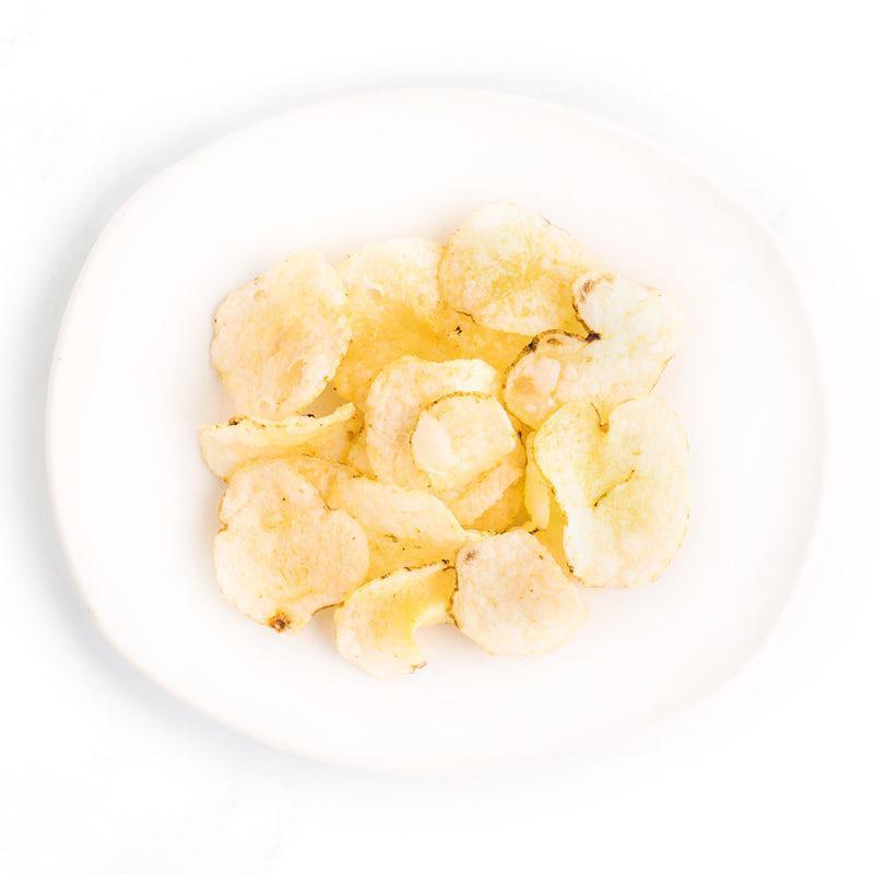 Chips · Thick, kettle cooked chips seasoned in-house with Old Bay and cracked black pepper.