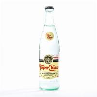 Topo Chico Sparkling Water · A fizzy, refreshing beverage sold in bottles. 