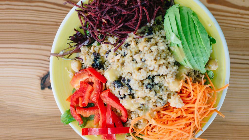 Rainbow · Quinoa, avocado, carrot, beet, bell pepper, scallion, chickpea, currant, toasted almond, zesty ginger - garlic dressing.