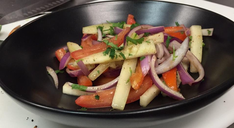Kachumber Salad · Red onions, tomatoes, cucumber, mixed with lemon-lime vinaigrette.