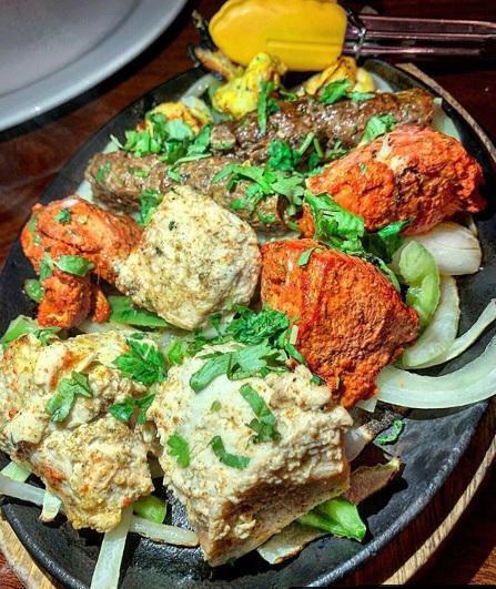 Mixed Tandoori Grill · Chicken tikka, malai kebab, lamb seekh kebab, tandoori shrimp.
