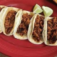 Chorizo taco · 3 tacos, served naked. Please add onions and cilantro if you'd like them.