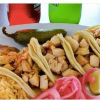 Taco Street Special · 4 tacos your choice of meat. Served with rice and beans and a drink