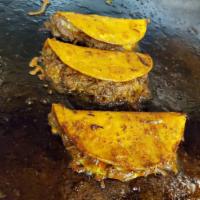 Queso Barbacoa Tacos  · 3 barbacoa and queso tacos fried, served with consume 