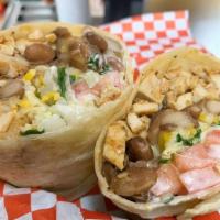Lengua Burrito · Large flour tortilla filled with lengua, beans, and cheese.