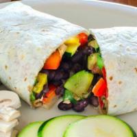 Veggie Burrito · Flour tortilla filled with sauteed yellow and green zucchini, mushrooms, broccoli, bell pepp...