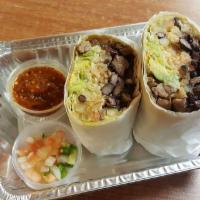 California Burrito · One of our most popular: Meat of choice,beans, rice, papas, guacamole, sour cream, pico de g...