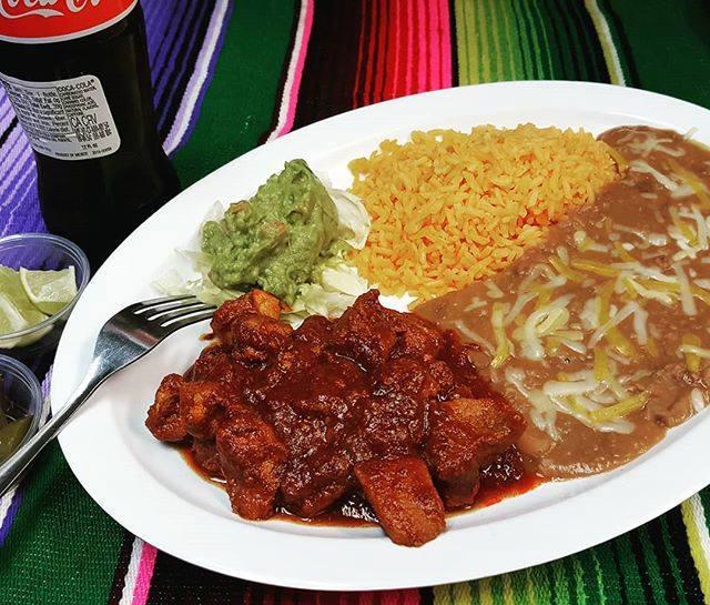 Chile Colorado Plate · Stewed pork and potato in red chile sauce. Served with beans and rice.