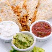 Chicken Quesadilla · Large flour tortilla filled with a blend of cheddar and pepper Jack cheese, shredded chicken...