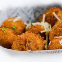Mashed Potato Bites · Creamy house made mashed potato balls filled with cheddar, pepper jack and Parmesan cheeses ...
