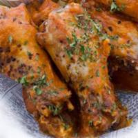 Buffalo Chicken Wings · Classic style wings in your choice of sauce (mild, medium, hot, nitro, or garlic Parmesan) w...