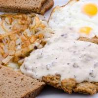 Country Fried Steak & Eggs · Served with country gravy & 2 eggs, served with hash browns choice of toast.