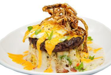 Hendertucky Moco Loco · Grilled angus steak patty, chicken fried rice, house-made gravy, fried eggs and spicy aioli topped with crispy fried onions.