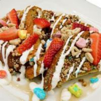 Luck of the Irish French Toast · Battered brioche bread crusted in lucky charms cereal and topped with lucky charms frosting ...