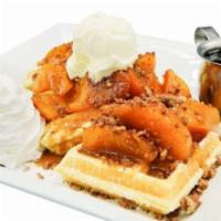 Peach Cobbler Waffle · Belgian waffle with roasted peach cobbler filling topped with cobbler crumble and whipped cr...