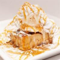 Bread Pudding · Warm brioche bread baked with our own custard, brown sugar, and candied pecans. Topped with ...