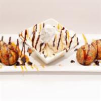 Confetti Deep Fried Oreos · 6 confetti battered Oreo cookies served with vanilla ice cream and drizzled with chocolate a...