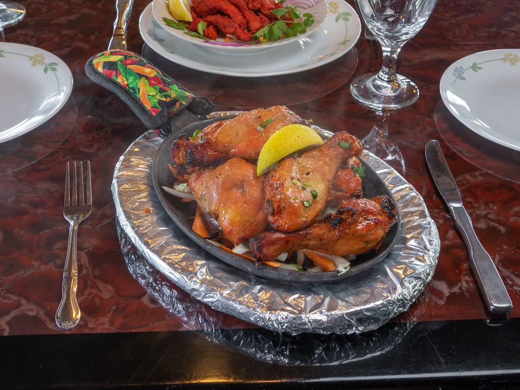 Tandoor Chicken · Chicken with bone marinated & cooked in clay oven.