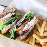 Chicken Club · Grilled chicken breast served with applewood smoked bacon, Swiss cheese, tomato, bibb lettuc...