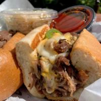 Philly Cheesesteak Sandwich · Grilled steak topped with melted provolone and American cheese, grilled onions, mushrooms, a...