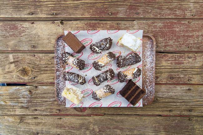 Assorted Mini Dessert Tray · 2 Mini Chocolate Cake, 2 Mini Crumb Cake, 4 Mini Traditional Cannoli and 4 Mini Chocolate Cannoli.