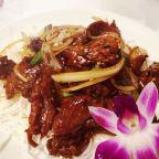 B05. Mongolian Beef · Stir - fried Onion, green onion and crispy rice noodle.
