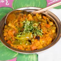 Vegetable Korma · Mixed vegetables cooked with nuts and spices in a creamy karma sauce.  Served mild (no spice...