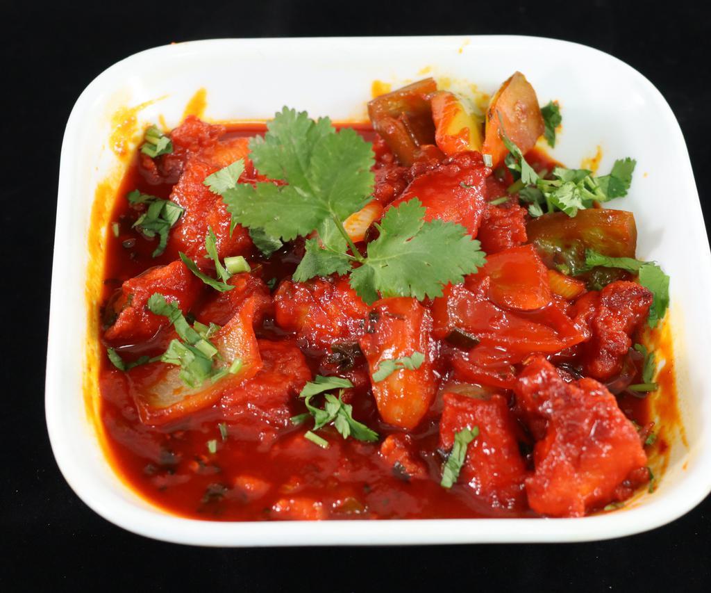 Chilly Chicken · Another finger food which follows the Indo-Chinese formula with some fresh onions and bell peppers.