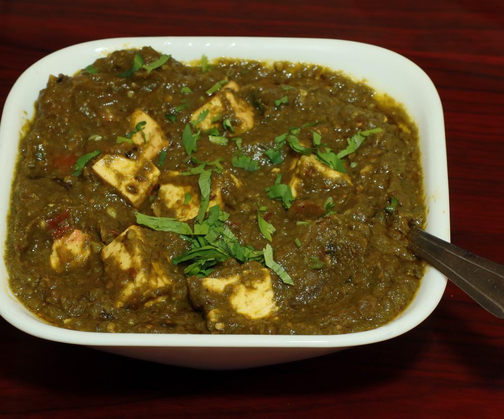 Paneer Saag · Paneer (cottage cheese) or channa (chickpeas) cooked in a leafy based sauce, saag (spinach) with a touch of cream and spices.