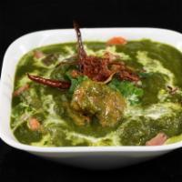 Chicken Saag · Chicken cooked in a leafy based sauce, saag (spinach) in this case with a touch of cream.