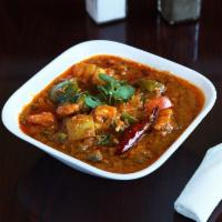 Kadai Chicken · Chicken cooked in a tomato and onion gravy base. This dish only requires 1 kadai (utensil) t...