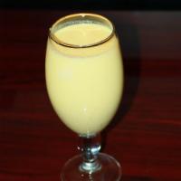 Mango Lassi · Alphonso mango pulp blended with yogurt and served with a straw for the brave!