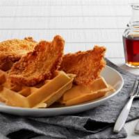 Fried Chicken & Waffles · Crispy hand-breaded chicken and two malted waffles with maple syrup.
