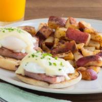 Classic Benedict · Hickory-smoked ham and poached eggs topped with hollandaise sauce on a grilled English muffin.
