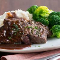 Pot Roast Dinner · Slowly braised and simmered in red wine shallot gravy.
Served with choice of two sides. 