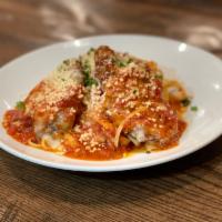 Parmesan Crusted Chicken Pasta · Crispy hand breaded parmesan chicken breast with melted
mozzarella and marinara sauce over l...
