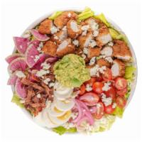 Green Goddess Cobb · Crispy chicken, crumbled blue cheese, bacon, pickled red onion, avocado, tomatoes, radish, e...