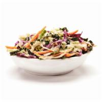 Super Slaw · Dino kale, red & green cabbage, carrots, toasted sesame seeds, Sweet & Creamy sauce