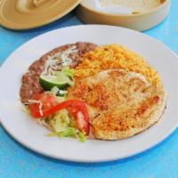 Pechuga Asada · Grilled chicken breast. Served with beans, salad and tortillas.