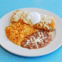 Burrito dinner · Served with a side of rice and beans. Comes with lettuce, tomato, cheese, beans and sour cre...