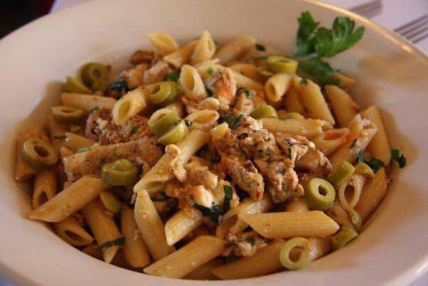Prima Pasta · Penne pasta, tossed with chicken, tomatoes, basil and feta in olive oil.
