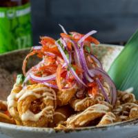 Calamari · Fried calamari topped with acevichado mayo, aji amarillo base and salsa criolla and fried yu...