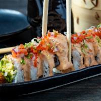 Rocoto Acevichado Maki Roll · Nikkei style sushi, filled with panko shrimp and avocado topped with white fish, chalaquita ...