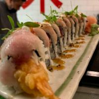 Hamachi-San Maki Roll · Kani krab salad, panko shrimp, avocado topped with hamachi, quinoa, eel sauce and lemon zest...