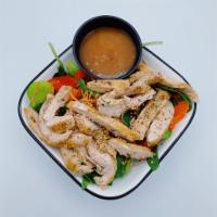 Thai Chicken Salad · Grilled chicken strips, peanuts, red and green peppers and carrots over mixed greens with to...