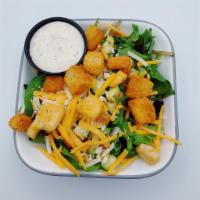 Side House Salad · Served with cucumbers, tomatoes, croutons, cheddar cheese and choice of dressing. Vegetarian.