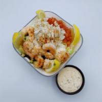 Crab and Shrimp Louie · Crab, shrimp, tomatoes, cucumbers and eggs served over iceburg lettuce and Louie dressing on...