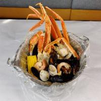 4 lb. Steamer Bucket · 1 lb. each of snow crab, shrimp, clams and mussels.