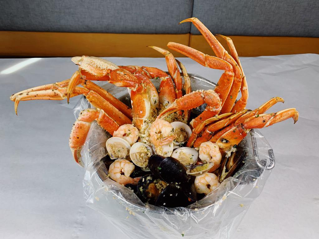 5 lb. Steamer Buckets · 1 lb. each of dungeness crab, snow crab, shrimp, clams and mussels.