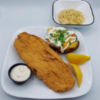Bayou Catfish · Served southern style cornmeal fried or blackened grilled. Accompanied with our spicy tartar...